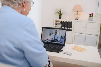 OrthoConnecticut patient participating in telemedicine appointment