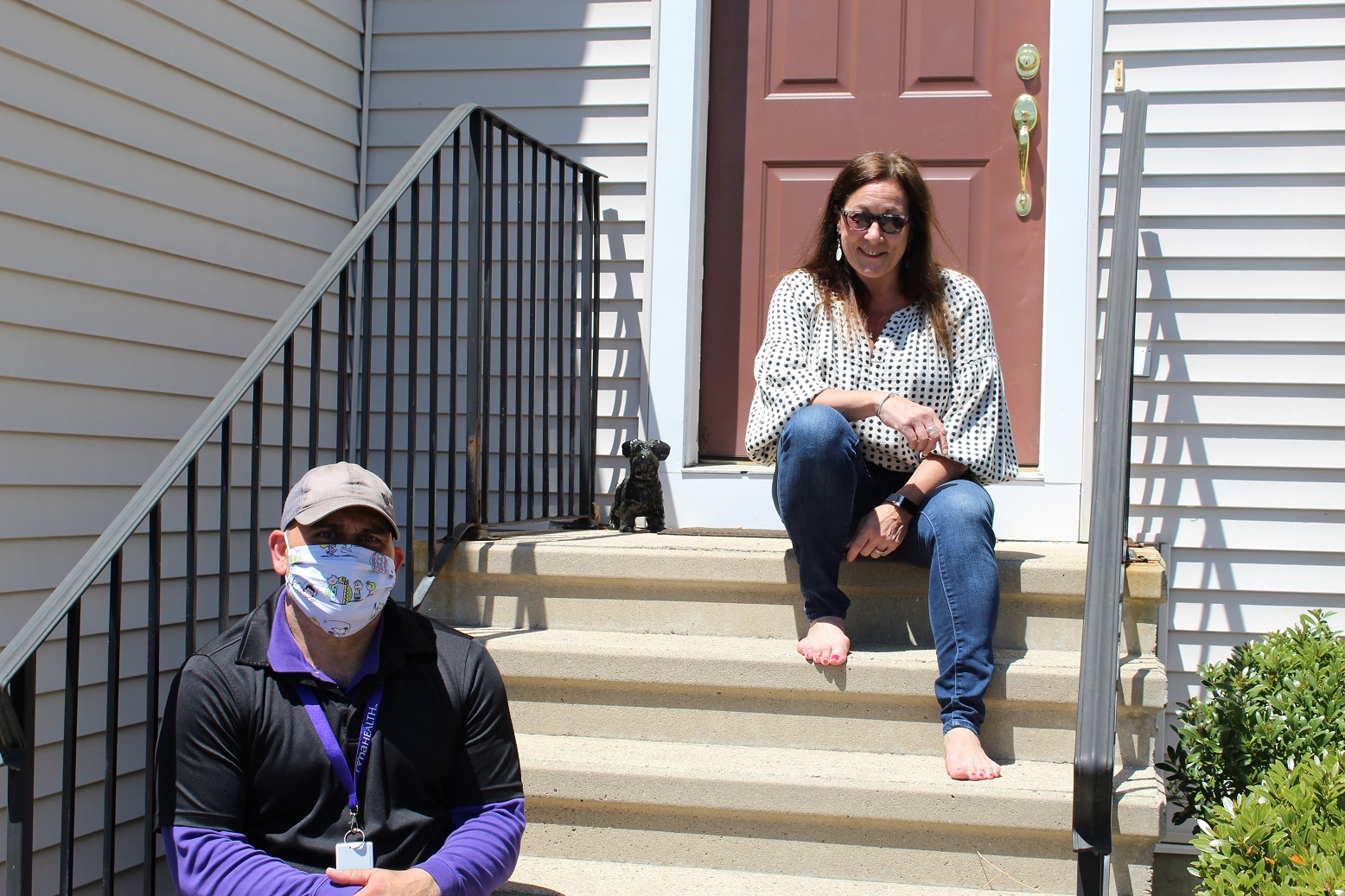 Terri Alexander prior to surgery discussing the stairs at her Home Safety Evaluation with RVNAhhealths Joe Naber OT