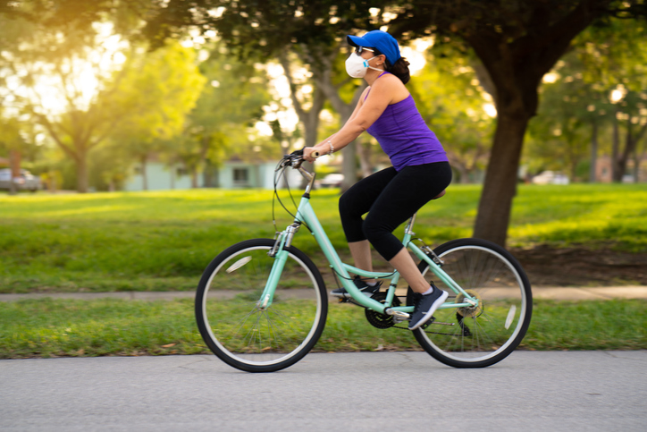 woman riding bicycle in the park