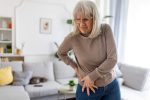 Older woman experiencing hip pain